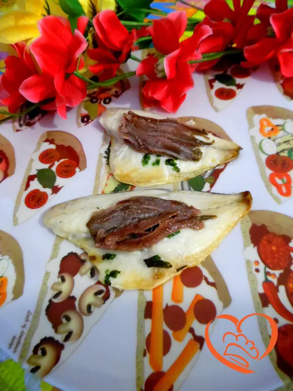 Orata con acciughe