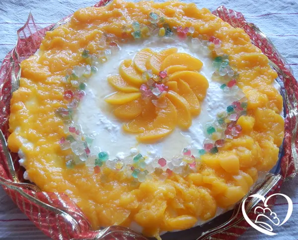 Cheesecake fredda alle pesche sciroppate