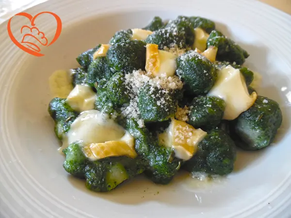 Gnocchi agli spinaci gratinati con formaggio