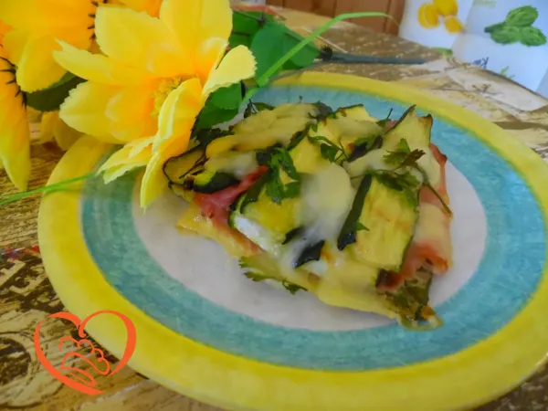 Parmigiana di zucchine e prosciutto cotto