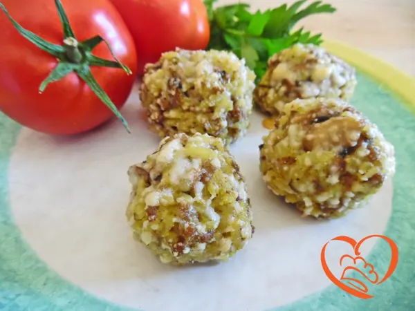 Polpette di risotto giallo in crosta di parmigiano