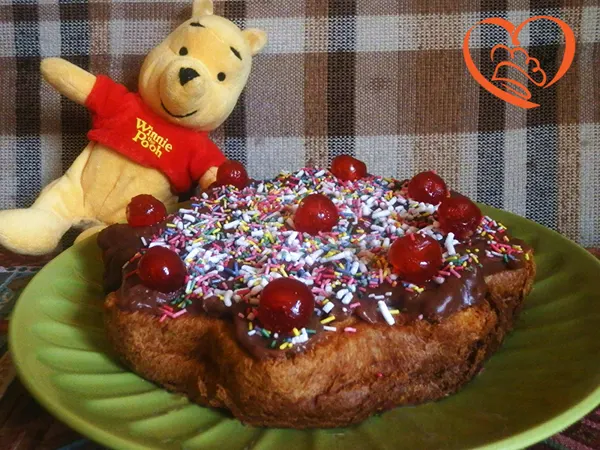 Stella di pandoro ricoperta di budino al cioccolato