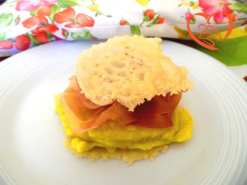 Trota salmonata impanata con prosciutto crudo e Parmigiano